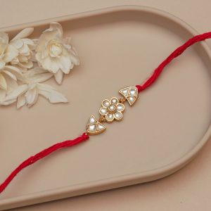 Floral Kundan Rakhi for Brother – Red Thread Rakhi with Central Flower and Triangle Stone Design